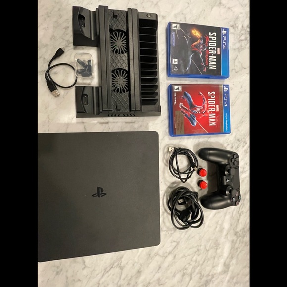This is a used PS4 slim and it comes with hdmi cable. - Picture 2 of 3